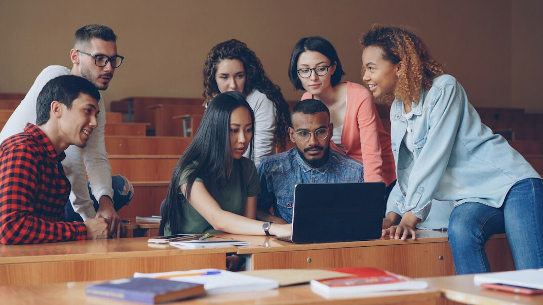 group of coding students in classroom